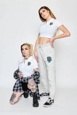 BROKEN PROMISES Poor Sport Cropped Polo Top Womens