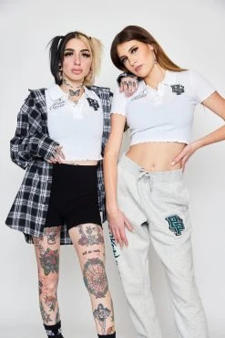 BROKEN PROMISES Poor Sport Cropped Polo Top Womens