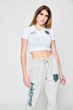 BROKEN PROMISES Poor Sport Cropped Polo Top Womens