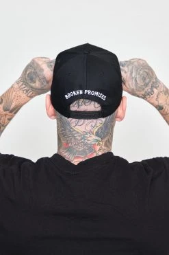 BROKEN PROMISES Headwear Crossbones Snapback
